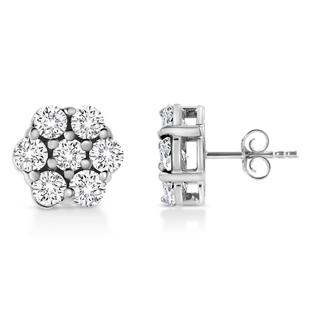 Floral and beautiful, these .925 sterling silver stud earrings feature sparkling lab grown diamonds in a prong setting....
