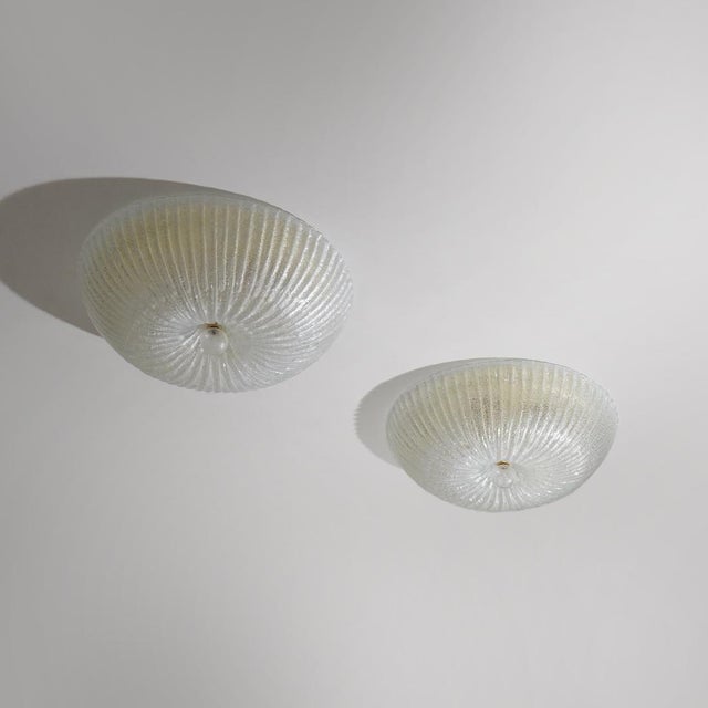 Designed and produced by murano luce in the 1990s, this large-scale ceiling light reinterprets the venetian glassmaking...