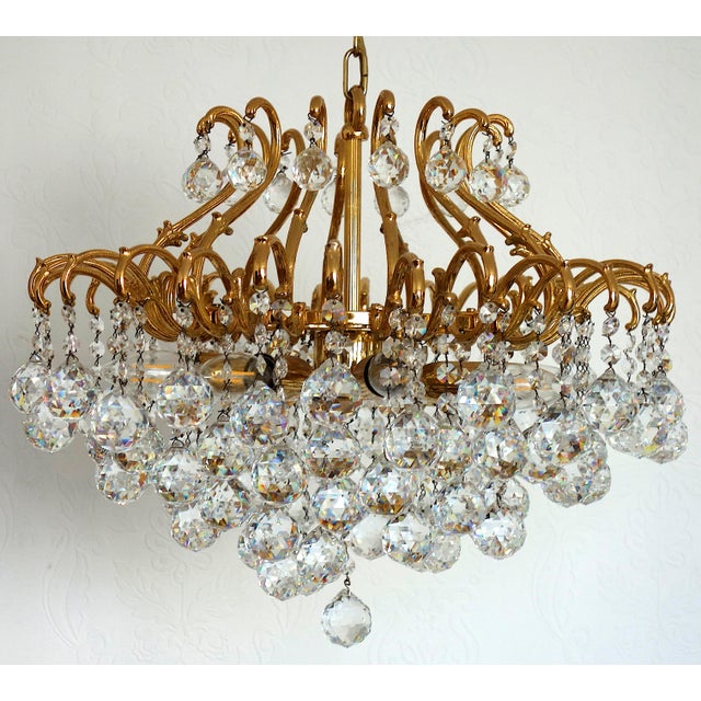 Vintage Brass and Lead Crystal Ball Chandelier from Schröder, 1970s, in Very Good conditions. Designed 1970 to 1979...