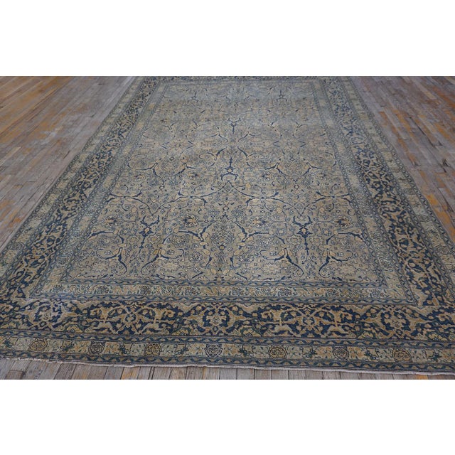 This antique Tabriz rug is a premier example of Northwest Persian craftsmanship, featuring precise, balanced designs and...