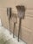 A wonderfully sculptural set of three late 19th century wooden garden tools, each hand-hewn with beautifully weathered...