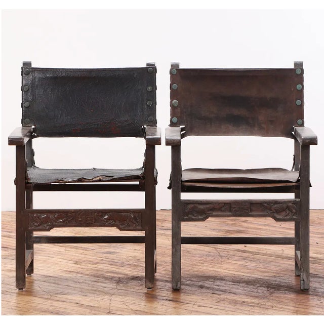 An beautifully rustic set of seven Spanish Colonial armchairs dating to the 18th century, crafted from richly patinated...