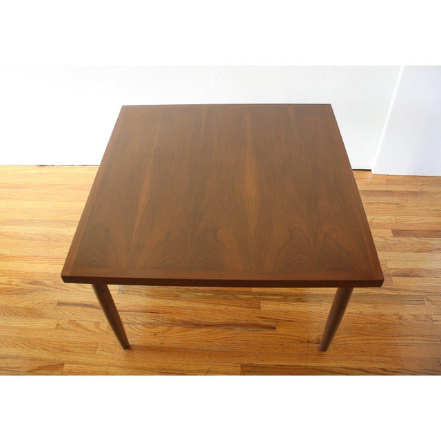 This is a mid century modern square coffee table designed by Merton Gershun for American of Martinsville. It has a...