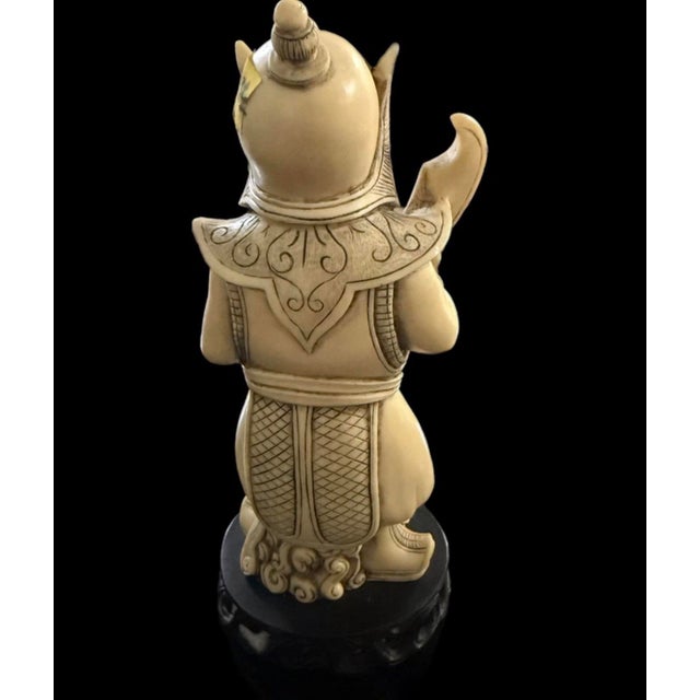 Vintage Carved Warrior Figure Made Of Resin Excellent condition Signed on Bottom This vintage carved warrior figure is...