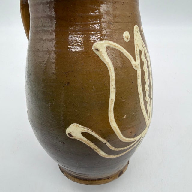 19th Century French Regional Slipware Earthenware Pitcher With Tulip Motif For Sale - Image 10 of 17