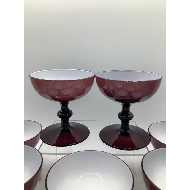 A gorgeous set of 6 Vintage 60’s Italian hand blown cased glass champagne coupes by Carlo Moretti. The measure 3 3/4”H x...
