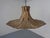 A ceiling lamp made of metal and cork, dating from the 1970s. Up to 250V (Europe/UK Standard).The wiring of this item may...