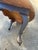 One-of-a-kind oval coffee table featuring a dramatic horse portrait in decoupage across the top, set against a distressed...