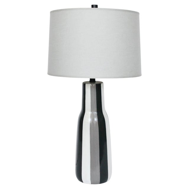 Monumental Design Technics handcrafted Glossy Glazed Table Lamp. Small footprint. Featuring an elongated bottle form with...