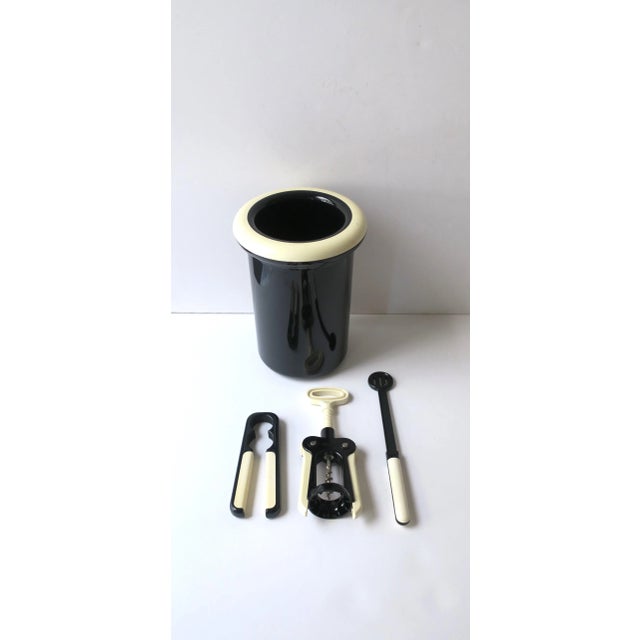 An Italian Postmodern black and white wine or Champagne cooler or ice bucket and bar tool set, circa late-20th century,...