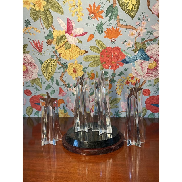 Elegant Steuben “shooting star” crystal set, showcasing modernist design and exceptional clarity. The set presents...