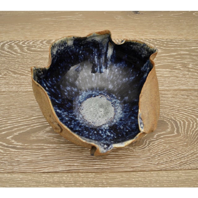Mid century brutalist art studio pottery bowl with rustic clay exterior finish and beautiful blue glazed interior. 8 1/2"...