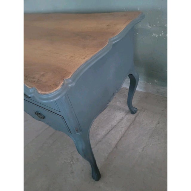Provençal centerpiece desk with lacquered base and natural top. Excellent overall condition, with minor signs of age....