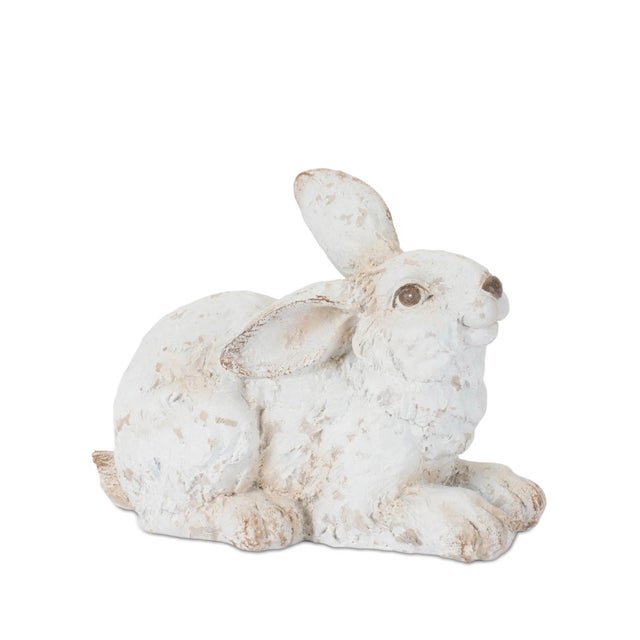 Add a rustic and charming touch to your decor with this rabbit figure set, featuring two bunnies in natural, relaxed poses...