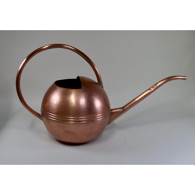 Very mid century modern looking copper watering can by Smith and Hawken. Gorgeous lines and very long and narrow spout to...