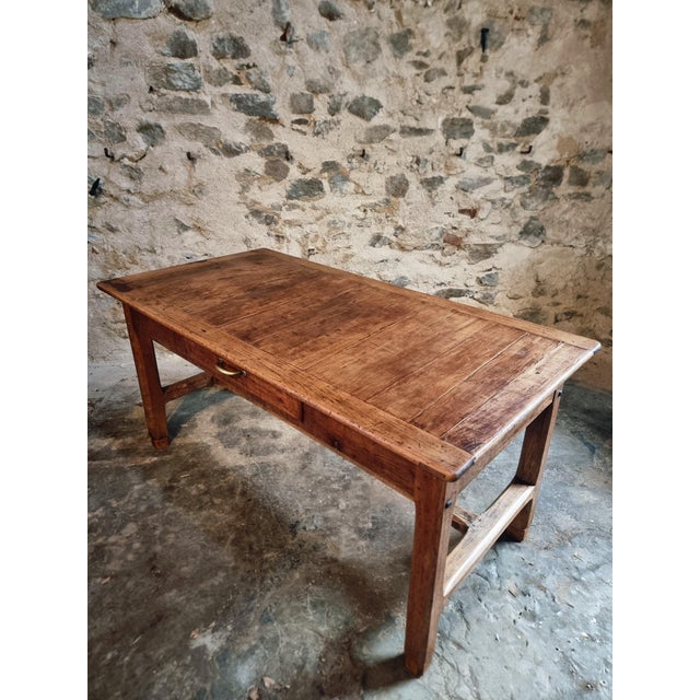 This French walnut dining table dates from the late 19th century and was originally used as a workshop or farmhouse work...