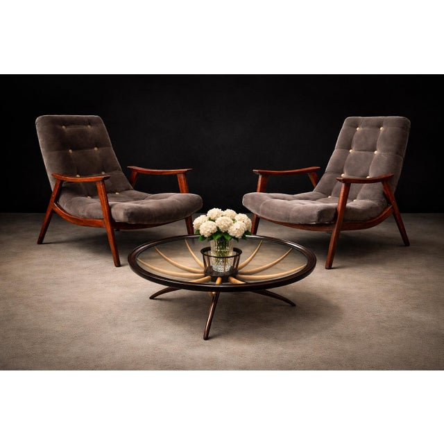 A sculptural and materially expressive pair of “Canoa” armchairs by Gelli, produced in Brazil during the 1960s — a period...