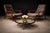 A sculptural and materially expressive pair of “Canoa” armchairs by Gelli, produced in Brazil during the 1960s — a period...