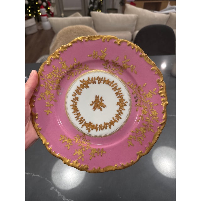Rare and exceptionally beautiful antique T&V Limoges (Tressemann & Vogt) dessert plate featuring a pink ground, raised 22k...