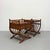 A beautifully crafted pair of vintage British Colonial nightstands featuring bamboo and rattan construction with woven...
