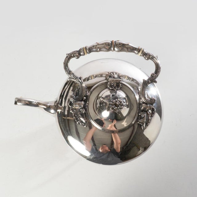 19th century silverplate tilting tea pot. Beautiful design, great for display or special occasions to help show elegance...