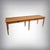 This solid cherrywood table exudes the charm of rustic furniture, its long lines perfectly balanced. Its top, with its...