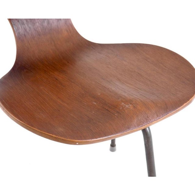 Pair of rare teak wood chairs with three iron legs, danish architect, 1960’sh. 83 h-seat. 44 w. 41 d. 39 cm h. 32.6...