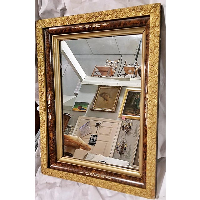 Fun find with this 19c American made Aesthetic Era Victorian style wall mirror with gilded leaf trim edges and a faux bois...