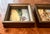 A small expressive oil painting set in matching gilt wood frames with an aged, patina + wear. The first depicts an...