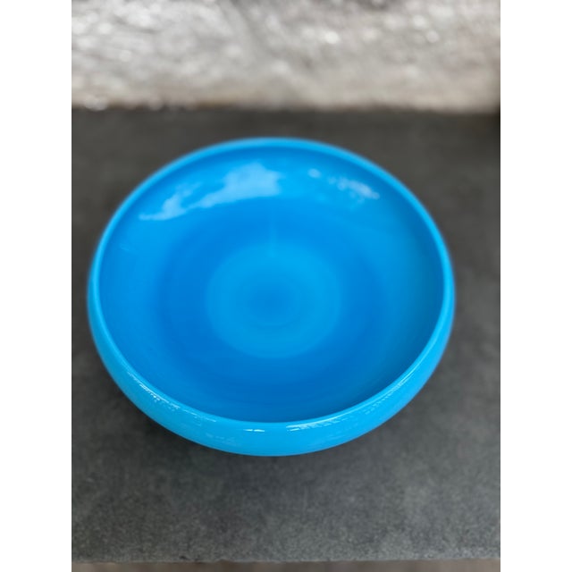 Blue glass footed bowl manufactured by Cambridge glass. The bowl is not marked.