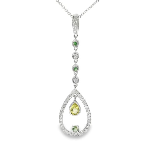 This 14K White Gold Diamond and Lemon Quartz Drop Pendant is an exquisite combination of vibrant gemstones and dazzling...