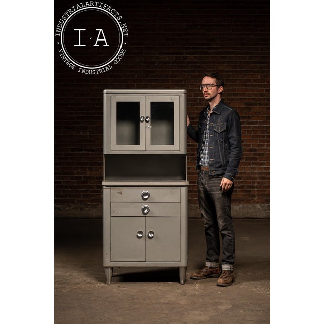 c. 1950s-1960s; Hamilton Manufacturing Co. - Two Rivers, WI Tall, two-piece gray steel medical or dental cabinet designed...