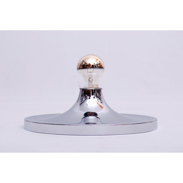 For sale is a wall or ceiling light by Honsel. Design: Charlotte Perriand. Chrome-plated metal. Light fixture sold without...