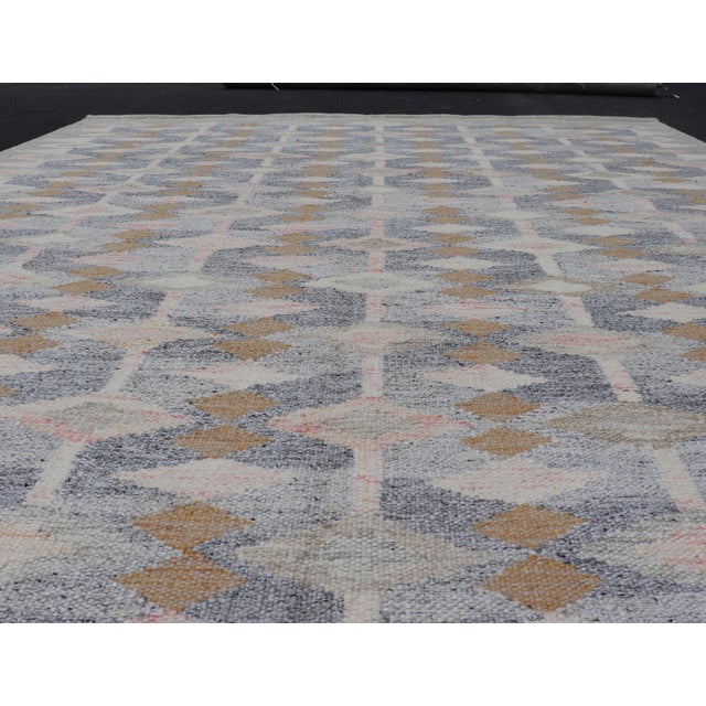 Measures: 8'10 x 12'0 Hand-Woven Scandinavian Wool Rug by Keivan Woven Arts, 8'10" x 12'0. Keivan Woven Arts / rug/...
