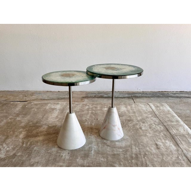 Halcyon s trio of tables in brass by jonathan amar studio dimensions: s : ø 136 cm × h 51 cm m : ø 41 cm × h 54 cm l : ø...