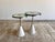 Halcyon s trio of tables in brass by jonathan amar studio dimensions: s : ø 136 cm × h 51 cm m : ø 41 cm × h 54 cm l : ø...