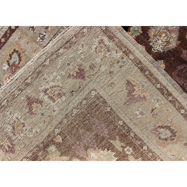 Textile Mid 20th Century Vintage Turkish Oushak Rug in Brown Background With All-Over Floral Design For Sale - Image 7 of 8