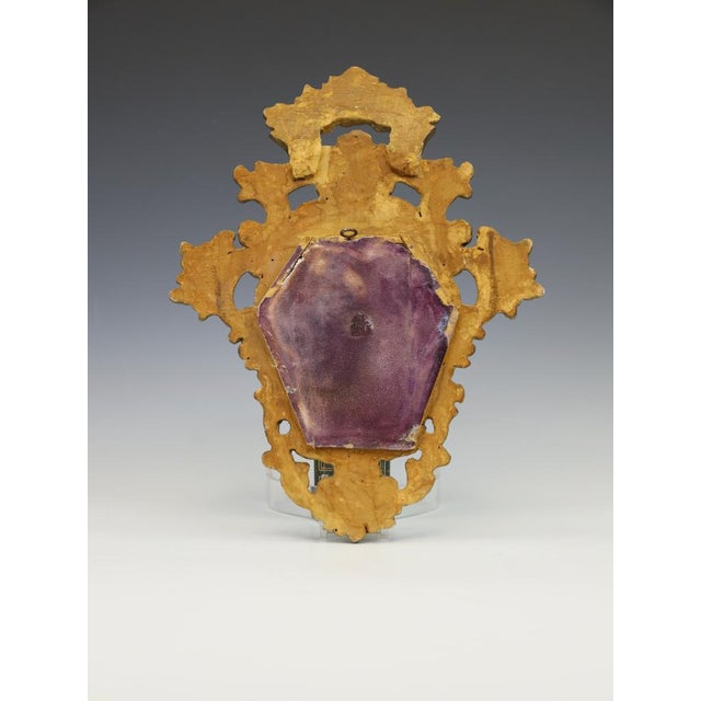 Rococo French Giltwood Wall Mirror, 1870, in Good conditions. Designed before 1890 This piece is designed in the style of...