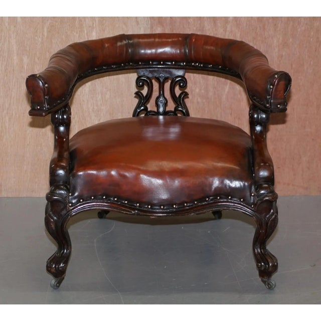 We are delighted to offer for sale this stunning fully restored cigar brown hand dyed leather Regency show framed armchair...