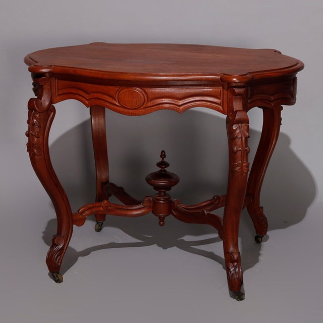 Antique Victorian Carved Walnut Turtle Top Parlor Table, circa 1890
