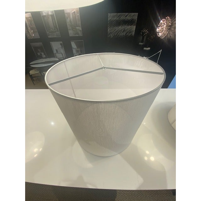 This Moare lamp shade is a masterpiece of minimalist elegance designed for sophisticated interiors. Its cylindrical form...