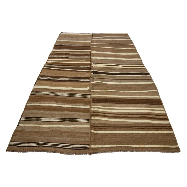 Handwoven vintage modern kilim rug from Kars region of Turkey. Approximately 50-60 years old. In very good condition