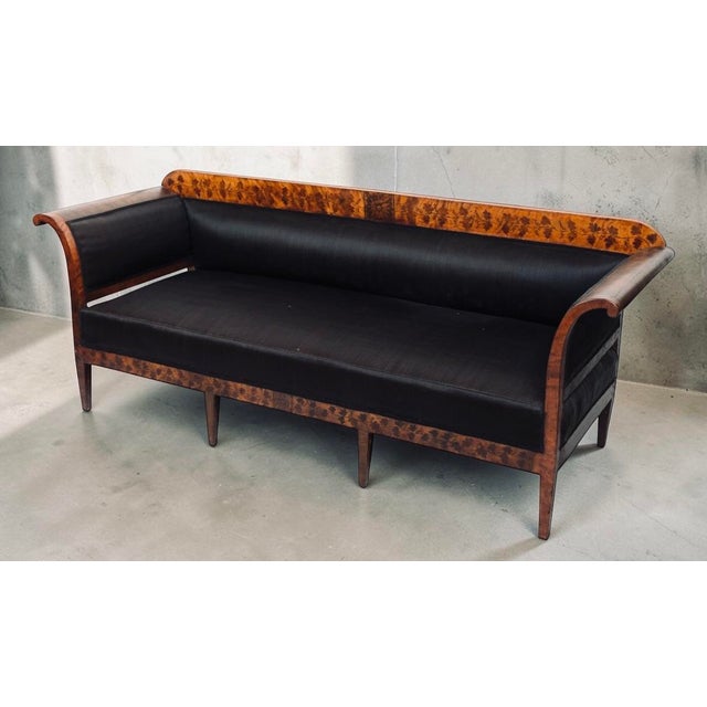 Exquisite and rare 19th Century Austrian / German Biedermeier sofa. The sofa features stunning floral detailing and...