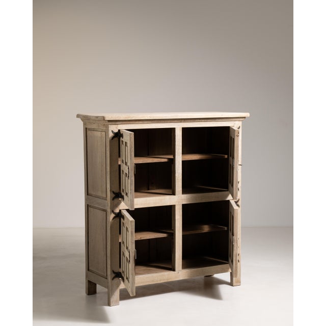 Executed in France circa 1970, this commanding oak buffet stands as a confident expression of the Brutalist aesthetic, its...