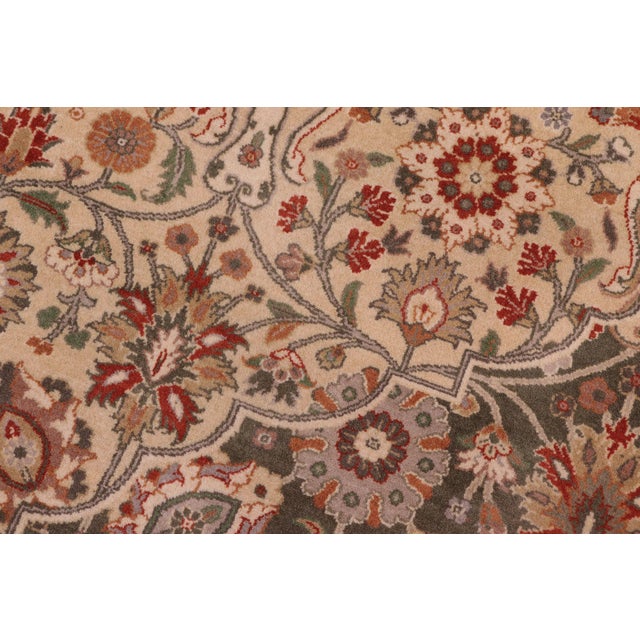 Designed with mesmerizing intricacy and gorgeous color palette, this hand-knotted masterpiece demonstrates the beauty and...