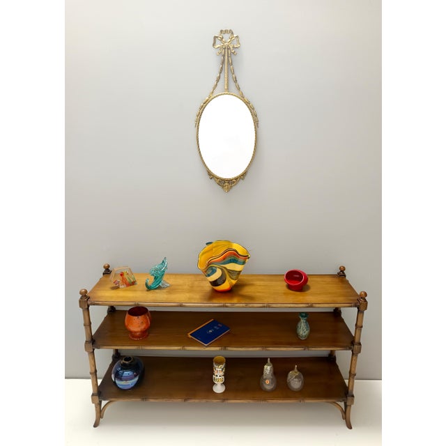 Made in Italy, 1950s. This shelving unit is made in durmast wood. It can be used fixed to the wall or as a divider. It may...