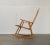 Mid Century wooden rocking chair with pedding cane seat from Deutsche Werkstätten Hellerau. Frame and base are made of...