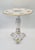 An elegant decorative porcelain table made by the renowned German manufacturer von Schierholz (Plaue, Thuringia). The...