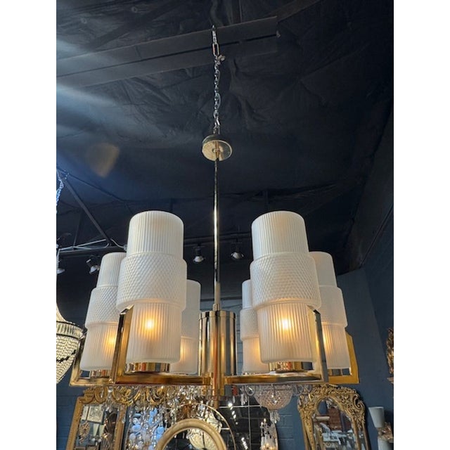 Modern Murano Glass Chandelier. Featuring textured glass and 6 brass arms. A great fixture that would be great with a...