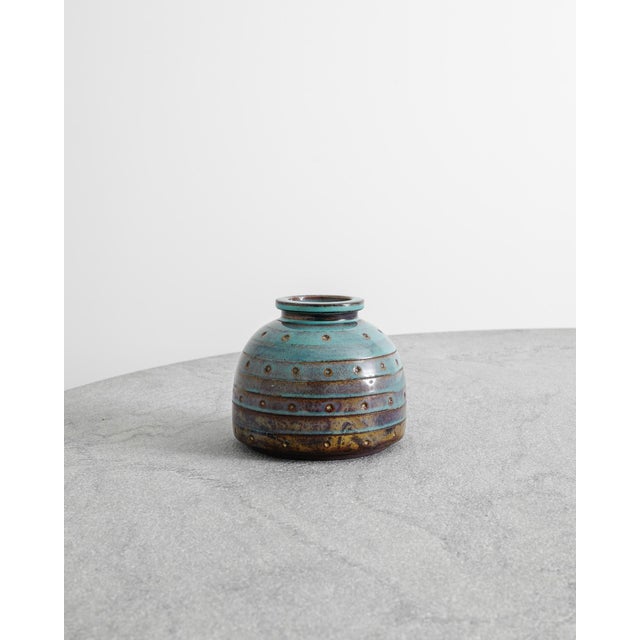 A rare and unique Swedish mid century "Farsta" stoneware vase in a decorative turquoise blue and brown glaze by Wilhelm...
